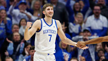 Dec 14, 2024; Lexington, Kentucky, USA; Kentucky Wildcats forward Andrew Carr (7) celebrates during the second half against the Louisville Cardinals at Rupp Arena at Central Bank Center. Mandatory Credit: Jordan Prather-Imagn Images