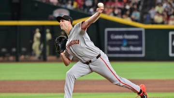 Jun 4, 2024; Phoenix, Arizona, USA;  San Francisco Giants pitcher Taylor Rogers (33) throws in the eighth inning against the Arizona Diamondbacks at Chase Field.