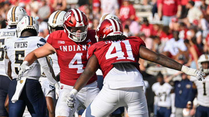 Indiana linebacker Aiden Fisher (4) and defensive end Lanell Carr Jr. (41) celebrate after a play against the Florida International Panthers at Memorial Stadium.