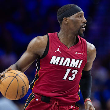 Apr 17, 2024; Philadelphia, Pennsylvania, USA; Miami Heat center Bam Adebayo (13) controls the ball against the Philadelphia 76ers during the first quarter of a play-in game of the 2024 NBA playoffs at Wells Fargo Center. Mandatory Credit: Bill Streicher-Imagn Images