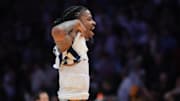 Memphis Grizzlies guard Ja Morant reacts after scoring the game-winning shot against the Miami Heat.