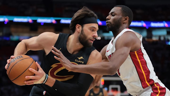 Apr 26, 2025; Miami, Florida, USA; Cleveland Cavaliers guard Max Strus (1) protects the basketball from Miami Heat forward Andrew Wiggins (22) in the first quarter during game three for the first round of the 2025 NBA Playoffs at Kaseya Center. Mandatory Credit: Sam Navarro-Imagn Images Apr 26, 2025; Miami, Florida, USA; Cleveland Cavaliers guard Max Strus (1) protects the basketball from Miami Heat forward Andrew Wiggins (22) in the first quarter during game three for the first round of the 2025 NBA Playoffs at Kaseya Center. Mandatory Credit: Sam Navarro-Imagn Images
