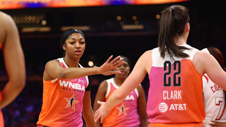 Jul 20, 2024; Phoenix, AZ, USA; Team WNBA guard Caitlin Clark (22) and Angel Reese against the USA Women's National Team during the 2024 WNBA All Star Game at Footprint Center. Mandatory Credit: Mark J. Rebilas-Imagn Images