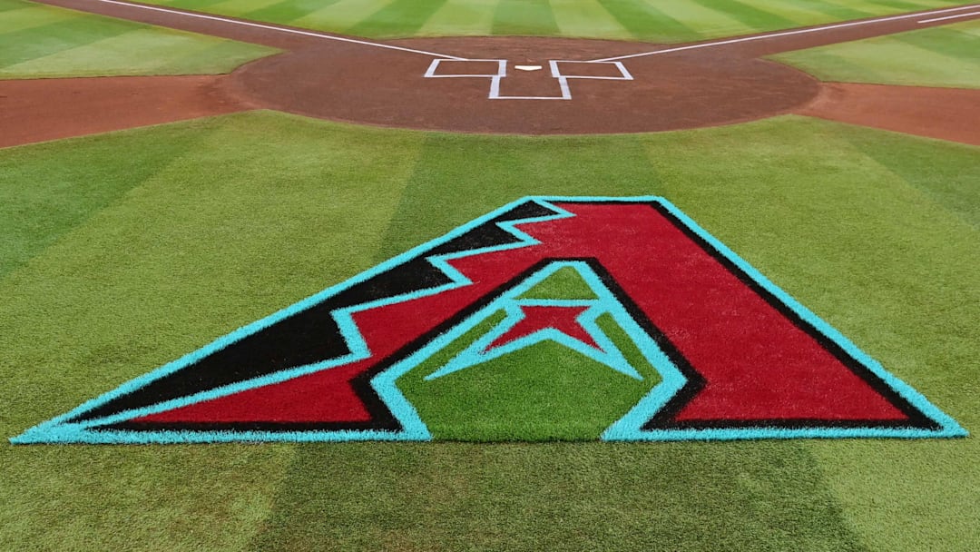 Apr 16, 2024; Phoenix, Arizona, USA; General view of the Arizona Diamondbacks logo on the field prior to the game against the Chicago Cubs at Chase Field. Mandatory Credit: Matt Kartozian-Imagn Images