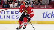 Apr 14, 2024; Chicago, Illinois, USA;  Chicago Blackhawks forward Andreas Athanasiou (89) skates against the Carolina Hurricanes at United Center. Mandatory Credit: Jamie Sabau-Imagn Images