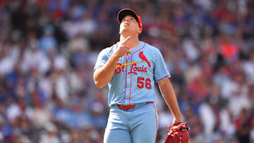 Jul 5, 2025; Chicago, Illinois, USA; St. Louis Cardinals pitcher Ryan Helsley (56) celebrates after defeating the Chicago Cubs at Wrigley Field. Mandatory Credit: Patrick Gorski-Imagn Images