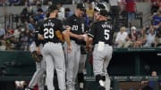 Jul 22, 2024; Arlington, Texas, USA; Chicago White Sox starting pitcher Erick Fedde (20) is taken out of the game by manager Pedro Grifol (5) during the seventh inning against the Texas Rangers at Globe Life Field. Mandatory Credit: Raymond Carlin III-USA TODAY Sports