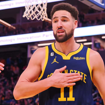 Jan 4, 2023; San Francisco, California, USA; Golden State Warriors shooting guard Klay Thompson (11) gestures to call the foul on himself after a play against the Detroit Pistons during the fourth quarter at Chase Center. Mandatory Credit: Kelley L Cox-USA TODAY Sports