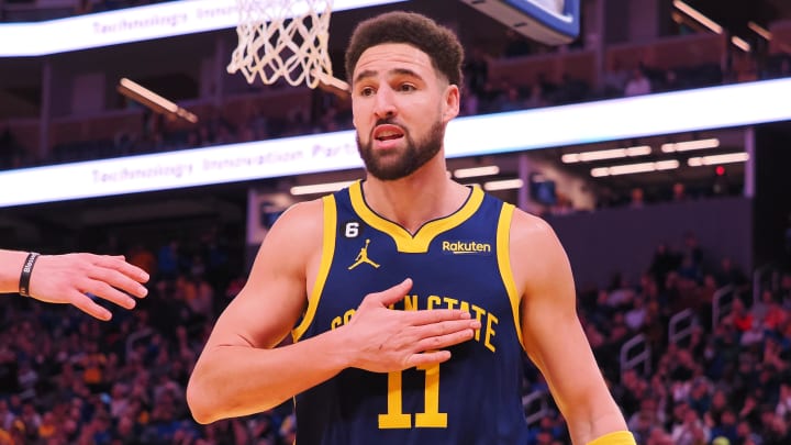 Jan 4, 2023; San Francisco, California, USA; Golden State Warriors shooting guard Klay Thompson (11) gestures to call the foul on himself after a play against the Detroit Pistons during the fourth quarter at Chase Center. Mandatory Credit: Kelley L Cox-USA TODAY Sports