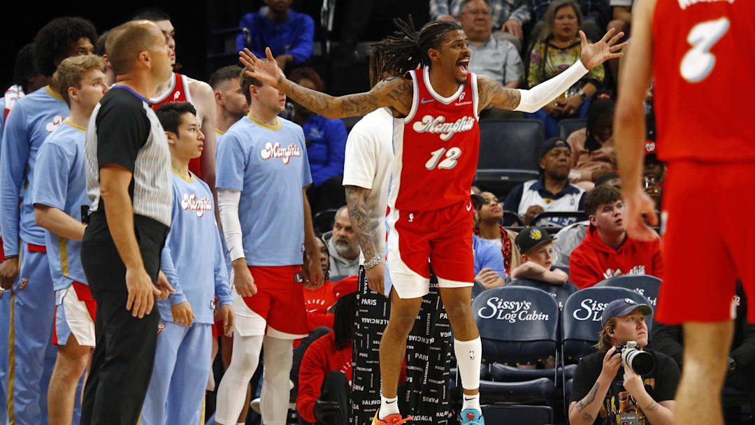 Apr 10, 2025; Memphis, Tennessee, USA; Memphis Grizzlies guard Ja Morant (12) reacts from the bench area during the fourth quarter against the Minnesota Timberwolves at FedExForum. Mandatory Credit: Petre Thomas-Imagn Images
