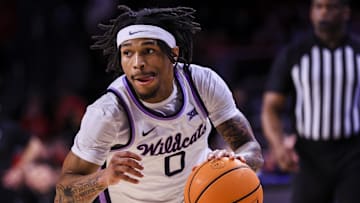 Mar 5, 2025; Cincinnati, Ohio, USA; Kansas State Wildcats guard Dug McDaniel (0) dribbles against the Cincinnati Bearcats in the second half at Fifth Third Arena. Mandatory Credit: Katie Stratman-Imagn Images