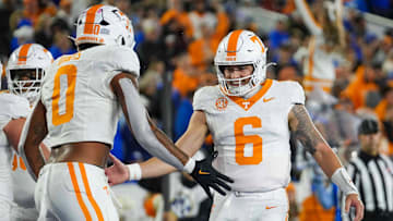 Tennessee quarterback Joey Aguilar (6) and Tennessee tight end Ethan Davis (0) celebrate after a touchdown during a NCAA football game against Kentucky at Kroger Field in Lexington, Kentucky on Oct. 25, 2025.
