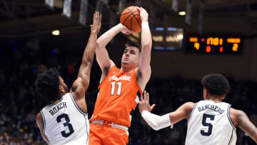 Jan 22, 2022; Durham, North Carolina, USA; Syracuse Orange guard Joe Girard III (11) shoots over Duke Blue Devils guard Jeremy Roach (3) during the first half  at Cameron Indoor Stadium. Mandatory Credit: Rob Kinnan-USA TODAY Sports