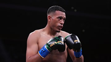 May 21, 2022; Glendale, Arizona, USA; David Benavidez (red trunks) and David Lemieux (black trunks)