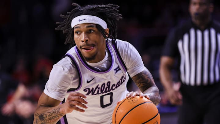 Mar 5, 2025; Cincinnati, Ohio, USA; Kansas State Wildcats guard Dug McDaniel (0) dribbles against the Cincinnati Bearcats in the second half at Fifth Third Arena. Mandatory Credit: Katie Stratman-Imagn Images