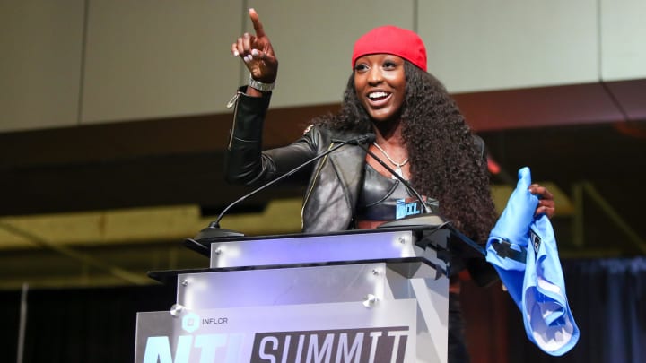 June 3, 2023; Atlanta, Georgia, USA; Flaujae Johnson speaks to the crowd during the 2023 NIL Summit at the Chick-fil-A College Football Hall of Fame. 