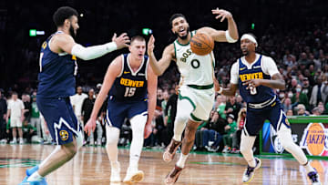 Jan 19, 2024; Boston, Massachusetts, USA; Boston Celtics forward Jayson Tatum (0) works for the ball