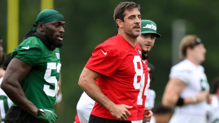 Jul 25, 2024; Florham Park, NJ, USA; New York Jets quarterback Aaron Rodgers (8) warms up during training camp at Atlantic Health Jets Training Center.