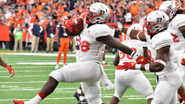 Sep 11, 2021; Syracuse, New York, USA; Rutgers Scarlet Knights defensive lineman CJ Onyechi (26) celebrates a fumble recovery against the Syracuse Orange in the fourth quarter at the Carrier Dome. Mandatory Credit: Mark Konezny-Imagn Images