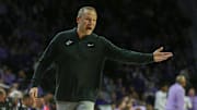 Jan 25, 2025; Manhattan, Kansas, USA; West Virginia Mountaineers head coach Darian DeVries questions a call by officials during the second half against the Kansas State Wildcats at Bramlage Coliseum. Mandatory Credit: Scott Sewell-Imagn Images