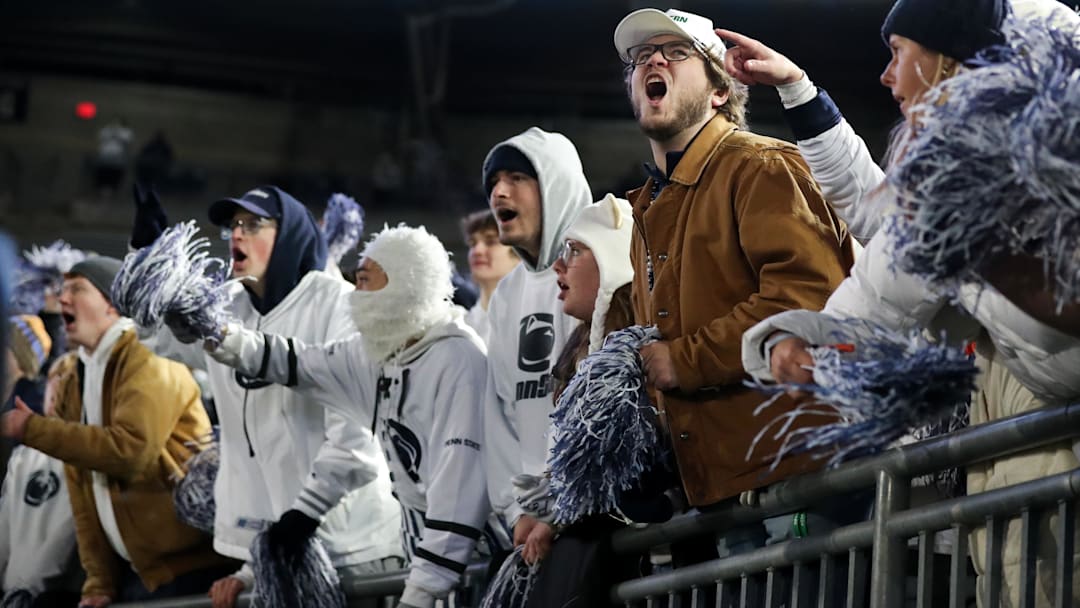 Penn State Nittany Lion fans cheer during the fourth quarter against the Nebraska Cornhuskers Penn State Nittany Lion fans cheer during the fourth quarter against the Nebraska Cornhuskers