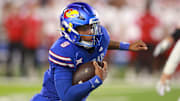 Kansas Jayhawks quarterback Isaiah Marshall (8) runs the ball during the game between Fresno State and Kansas at David Booth Kansas Memorial Stadium on Aug. 23, 2025.
