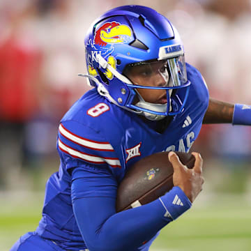 Kansas Jayhawks quarterback Isaiah Marshall (8) runs the ball during the game between Fresno State and Kansas at David Booth Kansas Memorial Stadium on Aug. 23, 2025.
