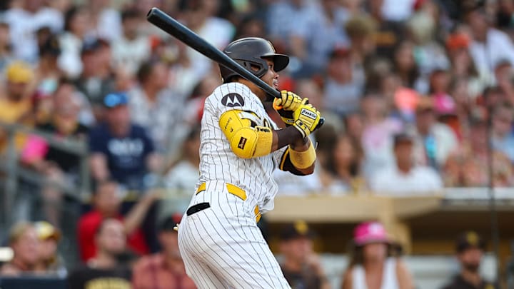 Sep 7, 2024; San Diego, California, USA; San Diego Padres designated hitter Luis Arraez (4) singles during the third inning against the San Francisco Giants at Petco Park. Mandatory Credit: Chadd Cady-Imagn Images