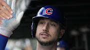 Oct 2, 2025; Chicago, Illinois, USA; Chicago Cubs outfielder Kyle Tucker (30) is greeted in the dugout after scoring against the San Diego Padres during game three of the Wildcard round for the 2025 MLB playoffs at Wrigley Field. Mandatory Credit: David Banks-Imagn Images