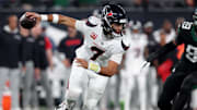 Oct 31, 2024; East Rutherford, New Jersey, USA; Houston Texans quarterback C.J. Stroud (7) looks to pass against the New York Jets during the first quarter at MetLife Stadium. Mandatory Credit: Brad Penner-Imagn Images