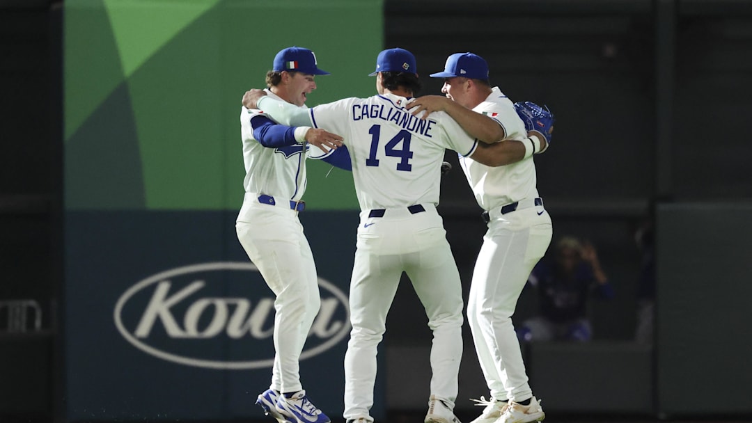 Mar 14, 2026; Houston, TX, United States; Italy right fielder Jac Caglianone (14) and center fielder Jakob Marsee (5) and outfielder Nick Morabito (7) celebrate after the game against Puerto Rico during a quarterfinal game of the 2026 World Baseball Classic at Daikin Park. Mandatory Credit: Troy Taormina-Imagn Images Mar 14, 2026; Houston, TX, United States; Italy right fielder Jac Caglianone (14) and center fielder Jakob Marsee (5) and outfielder Nick Morabito (7) celebrate after the game against Puerto Rico during a quarterfinal game of the 2026 World Baseball Classic at Daikin Park. Mandatory Credit: Troy Taormina-Imagn Images