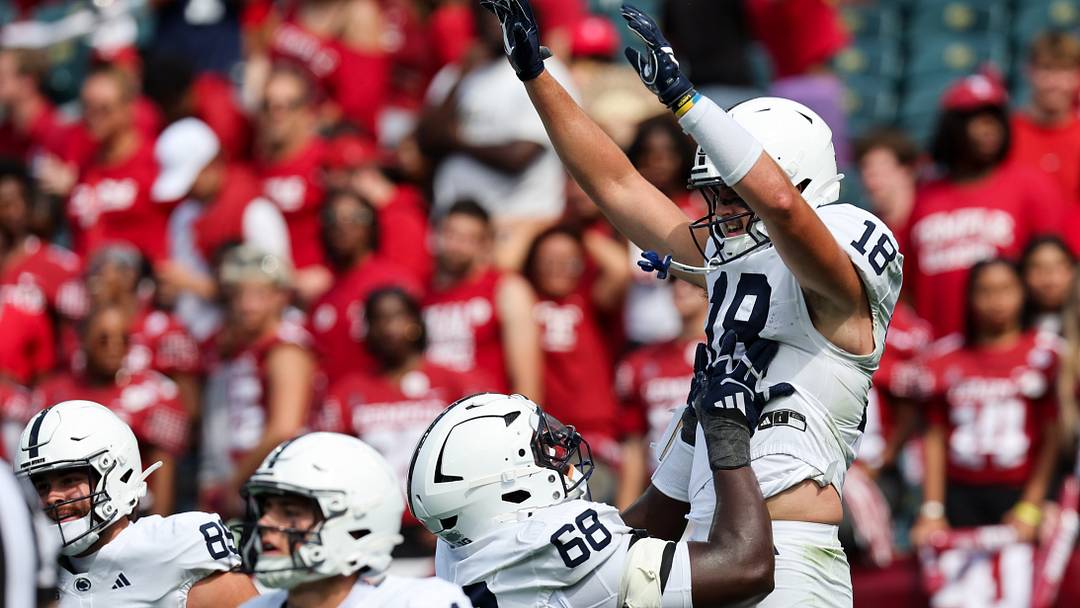Penn State Nittany Lions tight end Benjamin Brahmer (18) celebrates with offensive lineman Anthony Donkoh (68) after scoring a touchdown against the Temple Owls at Lincoln Financial Field. Penn State Nittany Lions tight end Benjamin Brahmer (18) celebrates with offensive lineman Anthony Donkoh (68) after scoring a touchdown against the Temple Owls at Lincoln Financial Field.