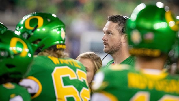 Oregon head coach Dan Lanning watches the video board as it plays a targeting review as the Oregon Ducks host the Boise State