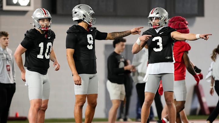 Ohio State's quarterback competition is heating up this spring. Ohio State's quarterback competition is heating up this spring.