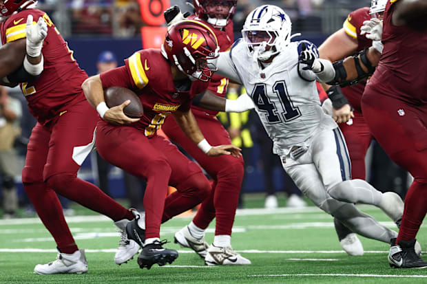 Dallas Cowboys defensive end Donovan Ezeiruaku sacks Washington Commanders quarterback Marcus Mariota. Dallas Cowboys defensive end Donovan Ezeiruaku sacks Washington Commanders quarterback Marcus Mariota.