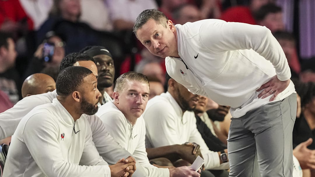 Mar 8, 2025; Athens, Georgia, USA; Georgia Bulldogs head coach Mike White talks with his staff during the game against the Vanderbilt Commodores during the second half at Stegeman Coliseum. Mandatory Credit: Dale Zanine-Imagn Images