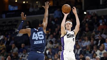 Jan 29, 2024; Memphis, Tennessee, USA; Sacramento Kings guard Kevin Huerter (9) shoots for three as Memphis Grizzlies forward GG Jackson (45) defends during the first half at FedExForum. Mandatory Credit: Petre Thomas-USA TODAY Sports