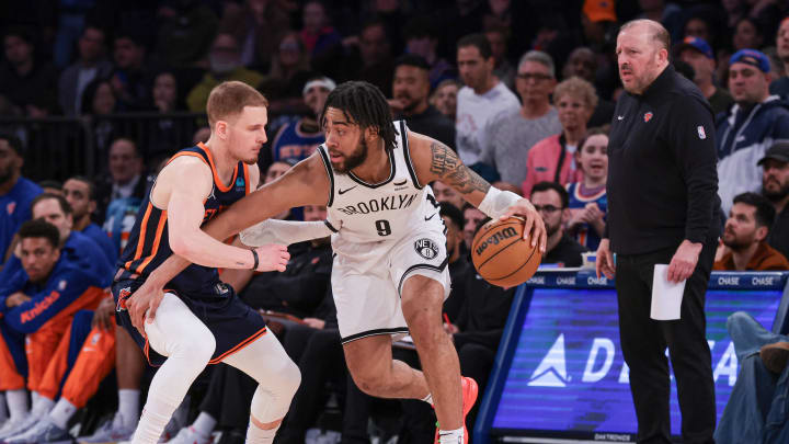 Apr 12, 2024; New York, New York, USA; Brooklyn Nets forward Trendon Watford (9) dribbles against New York Knicks guard Donte DiVincenzo (0) in front of head coach Tom Thibodeau during the second half at Madison Square Garden. Mandatory Credit: Vincent Carchietta-USA TODAY Sports