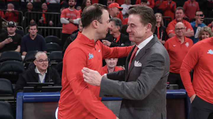 New Mexico Lobos head coach Richard Pitino and St. John's Red Storm head coach Rick Pitino