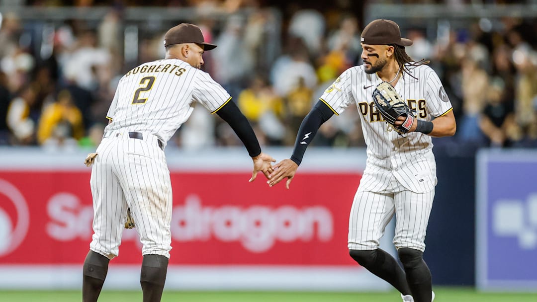 Apr 16, 2026; San Diego, California, USA; San Diego Padres shortstop Xander Bogaerts (2) celebrates with right fielder Fernando Tatis Jr. (23) after defeating the Seattle Mariners at Petco Park. Mandatory Credit: David Frerker-Imagn Images