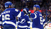 Nov 18, 2025; Tampa, Florida, USA; Tampa Bay Lightning center Jake Guentzel (59) is congratulated  after he scores a goal for a hat trick against the New Jersey Devils during the third period at Benchmark International Arena. Mandatory Credit: Kim Klement Neitzel-Imagn Images