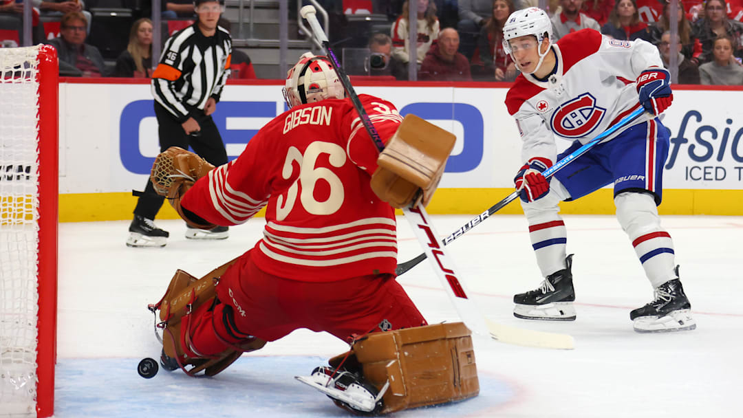 Detroit Red Wings goaltender John Gibson attempts to make a save against the Montreal Canadiens. Detroit Red Wings goaltender John Gibson attempts to make a save against the Montreal Canadiens.