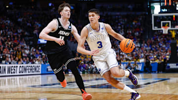 Mar 20, 2025; Denver, CO, USA; VCU Rams guard Max Shulga (11) defends against Brigham Young Cougars guard Egor Demin (3) during the second half in the first round of the NCAA Tournament at Ball Arena. Mandatory Credit: Isaiah J. Downing-Imagn Images