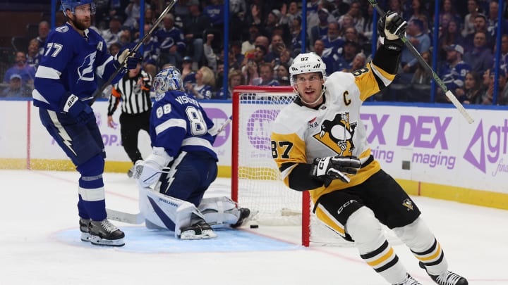 Nov 30, 2023; Tampa, Florida, USA; Pittsburgh Penguins center Sidney Crosby (87) celebrates after he scored a goal against the Tampa Bay Lightning during the second period at Amalie Arena. Mandatory Credit: Kim Klement Neitzel-USA TODAY Sports