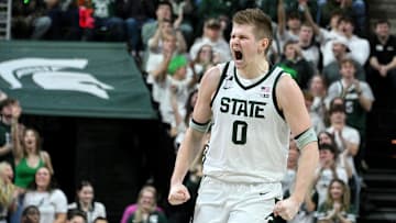 Jan 28, 2025; East Lansing, Michigan, USA;  Michigan State Spartans forward Jaxon Kohler (0) celebrates a big three point shot against the Minnesota Golden Gophers during the first half at Jack Breslin Student Events Center. Mandatory Credit: Dale Young-Imagn Images