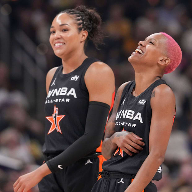Minnesota Lynx's Napheesa Collier and Minnesota Lynx's Courtney Williams laugh. 