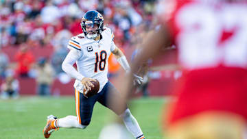 Dec 8, 2024; Santa Clara, California, USA; Chicago Bears quarterback Caleb Williams (18) scrambles during the fourth quarter against the San Francisco 49ers at Levi's Stadium. Mandatory Credit: Bob Kupbens-Imagn Images