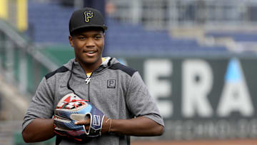 Jul 29, 2022; Pittsburgh, Pennsylvania, USA; Pittsburgh Pirates first round pick Termarr Johnson and fourth overall player drafted in the 2022 MLB Draft on the field before the Pirates host the Philadelphia Phillies at PNC Park. Mandatory Credit: Charles LeClaire-Imagn Images