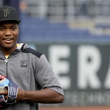 Jul 29, 2022; Pittsburgh, Pennsylvania, USA; Pittsburgh Pirates first round pick Termarr Johnson and fourth overall player drafted in the 2022 MLB Draft on the field before the Pirates host the Philadelphia Phillies at PNC Park. Mandatory Credit: Charles LeClaire-Imagn Images