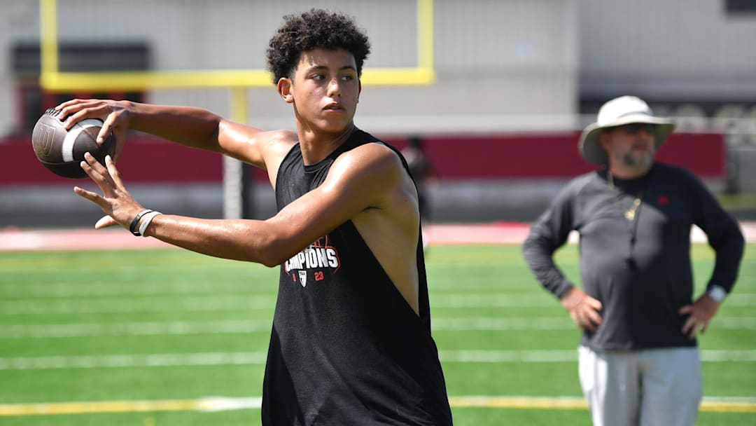 quarterback Davin Davidson passes the ball during 7-on-7 drills. Cardinal Mooney High football players participate in the school's summer strength and conditioning camp Monday, July 22, 2024. The Cougars won the FHSAA Class 1S state championship last year, defeating Trinity Catholic.